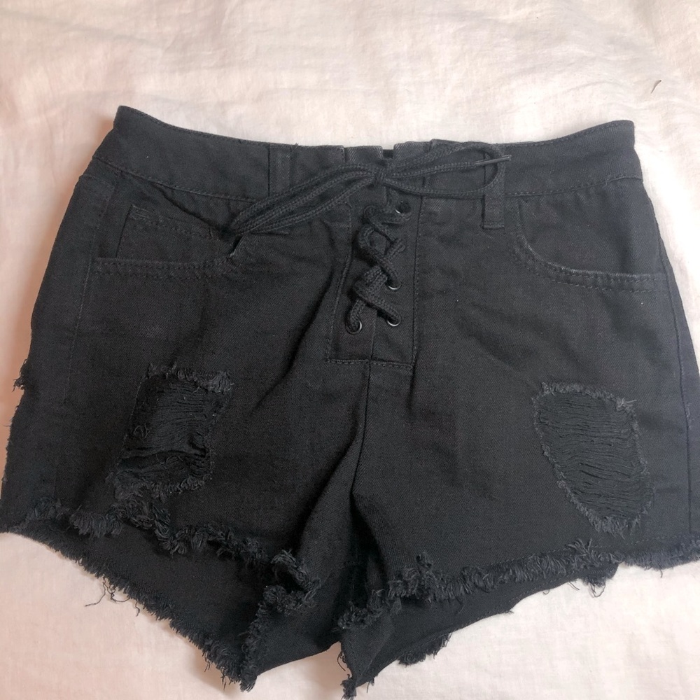 Distressed lace up denim shorts